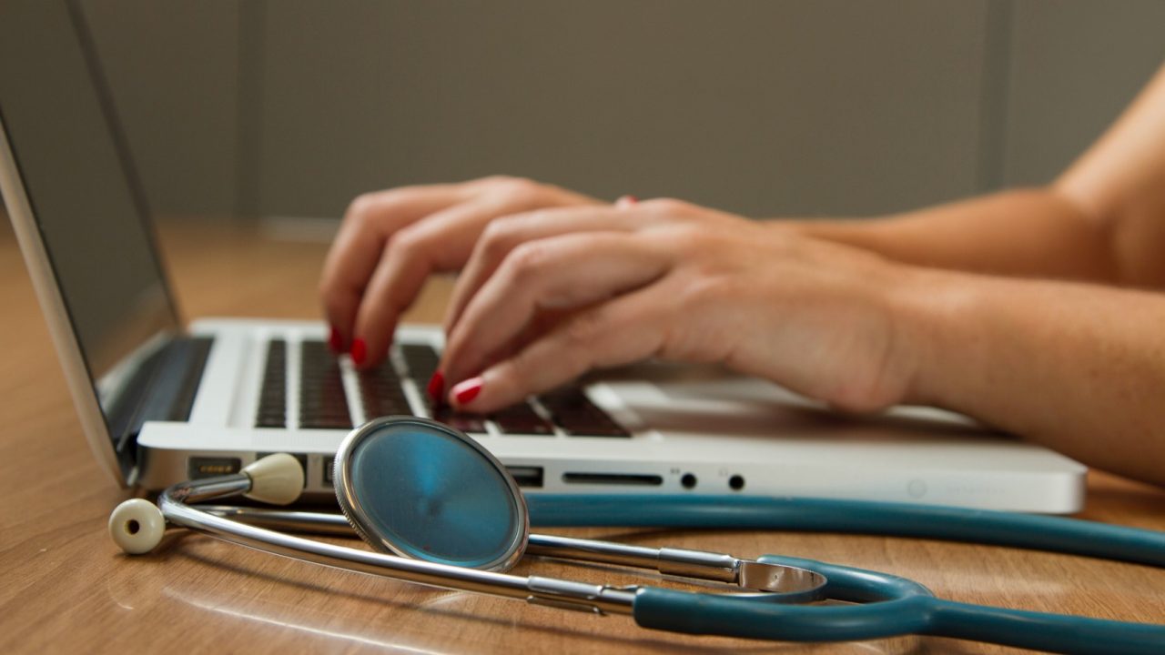 Doctor using a laptop