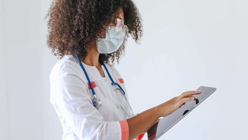 Doctor using tablet