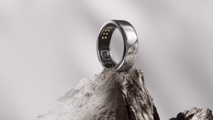 Ōura smart ring perched on a rock
