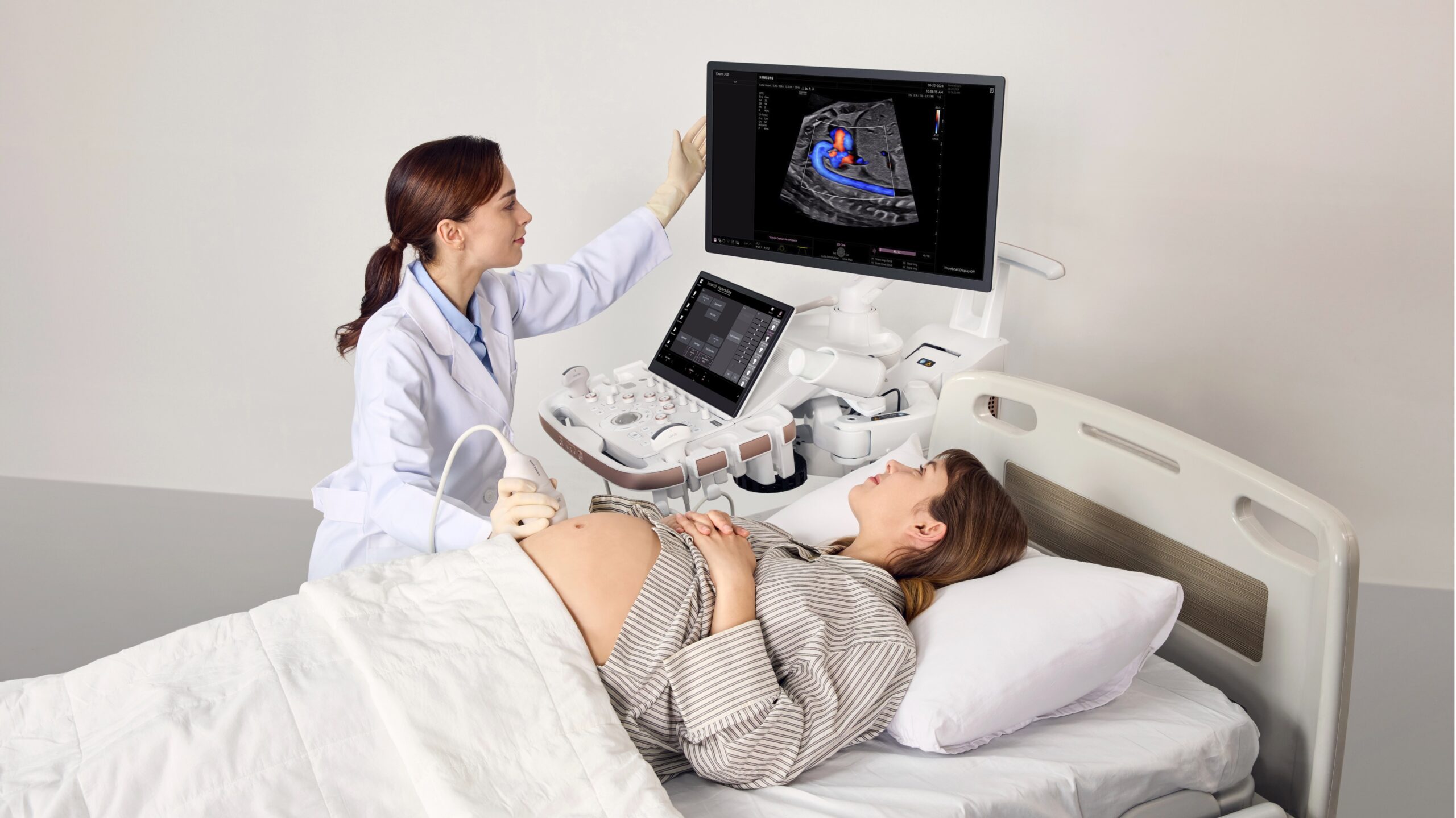 A pregnant woman with a Samsung Z20 ultrasound scanner