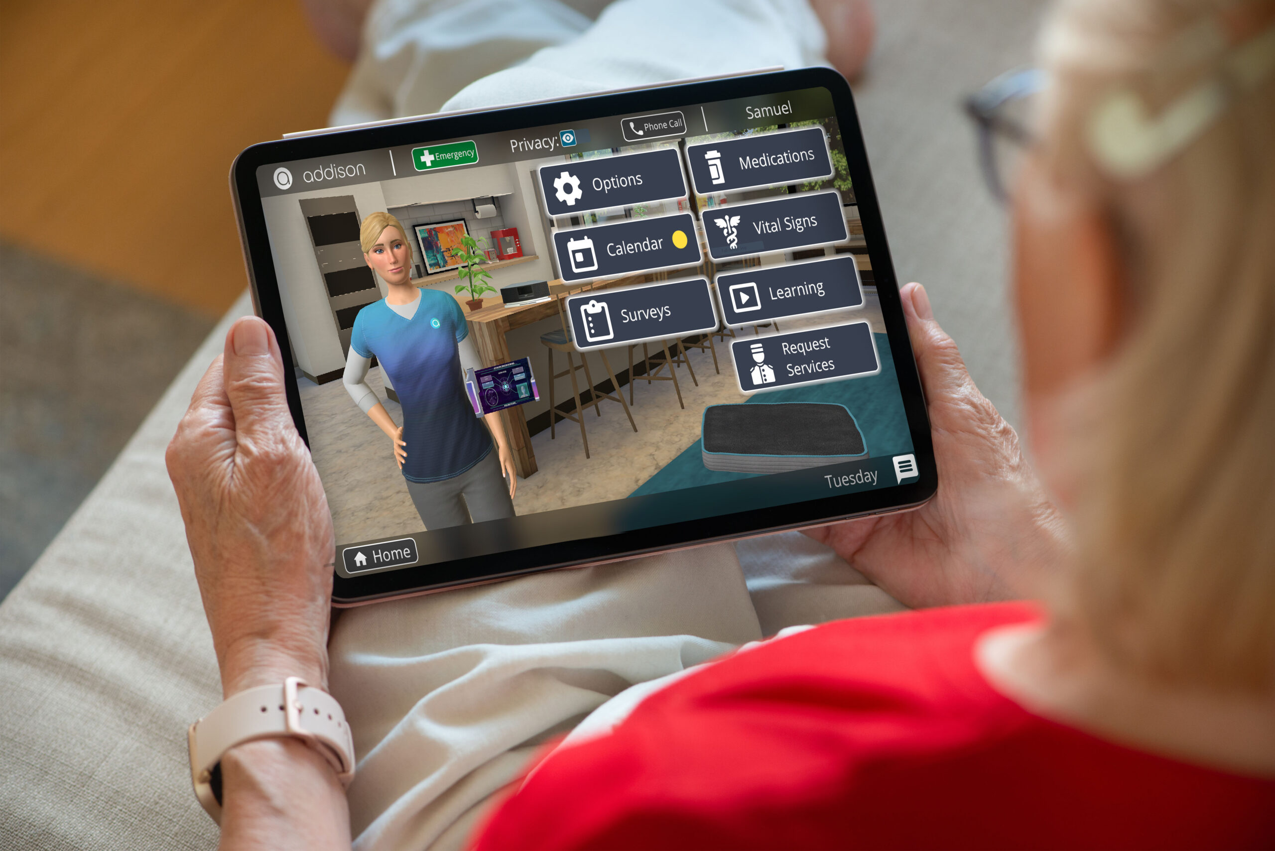 An elderly woman holding a computer tablet during a virtual care session